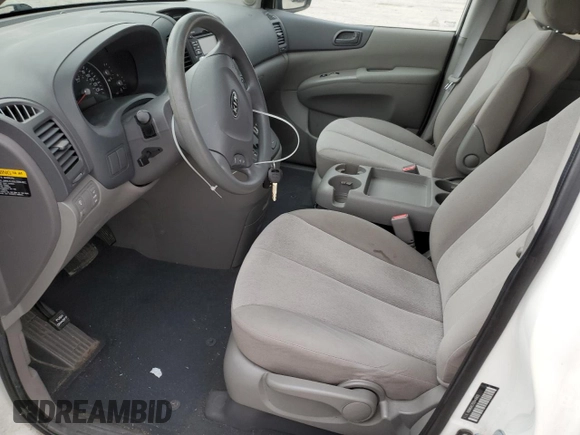 2012 Kia Sedona LX with VIN KNDMG4C75C6416415, listed as a Copart auction lot 51578585 with 115,296 mi miles and Salvage Title. Bid and sale history available at DreamBid. Image 7.