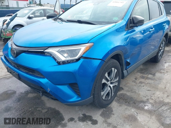 2018 Toyota RAV4 LE with VIN JTMBFREV8JJ220630, listed as a IAAI auction lot 42001795 with 86,027 mi miles. Bid and sale history available at carsss.com. Image 6.