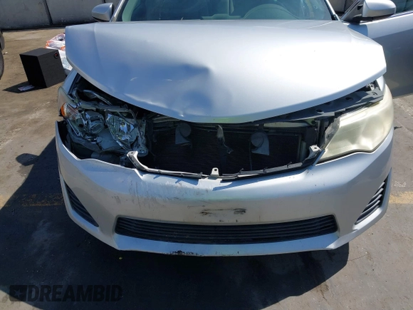 2013 Toyota Camry L with VIN 4T4BF1FKXDR313627, listed as a IAAI auction lot 41855022 with 128,782 mi miles. Bid and sale history available at carsss.com. Image 6.
