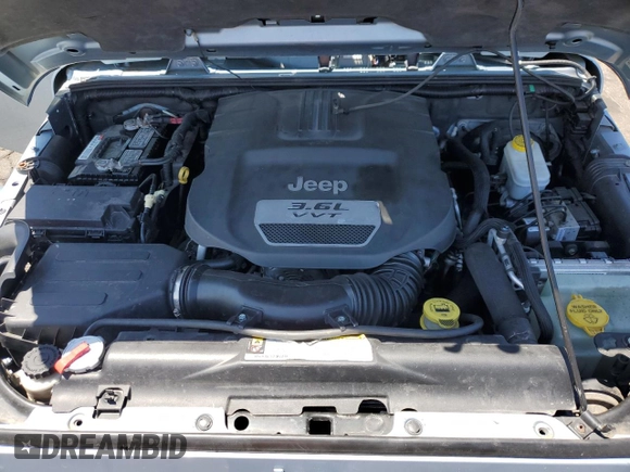 2012 Jeep Wrangler Arctic z VIN 1C4AJWBGXCL156600, wystawiony jako Copart lot #56369065 z przebiegiem 216 808 mil mil oraz Szkoda całkowita • Salvage title. Historia ofert i sprzedaży dostępna na DreamBid. Obrazek 11.