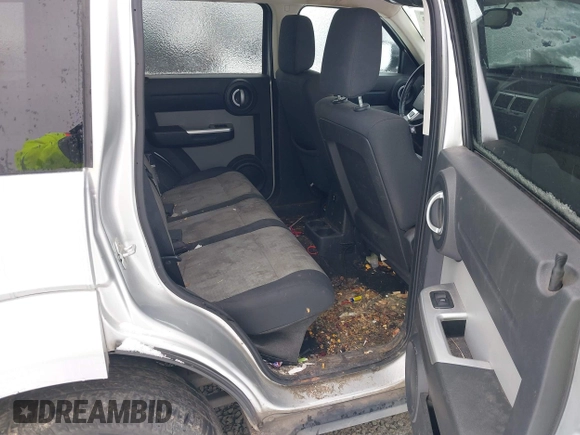 2007 Dodge Nitro SLT with VIN 1D8GU58K07W734541, listed as a IAAI auction lot 41556413 with 221,119 mi miles. Bid and sale history available at carsss.com. Image 8.