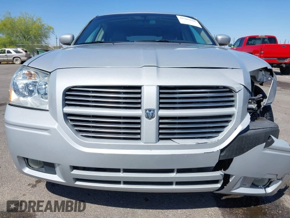 2005 Dodge Magnum z VIN 2D8GZ58235H576127, wystawiony jako IAAI lot #41989680 z przebiegiem 136 488 mil mil oraz . Historia ofert i sprzedaży dostępna na DreamBid. Obrazek 13.