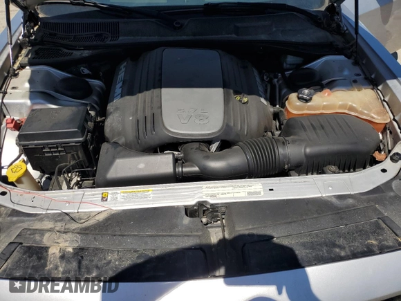 2012 Dodge Challenger R/T z VIN 2C3CDYBT0CH259731, wystawiony jako Copart lot #58033035 z przebiegiem 142 427 mil mil oraz Czysty tytuł • Clean title. Historia ofert i sprzedaży dostępna na DreamBid. Obrazek 11.