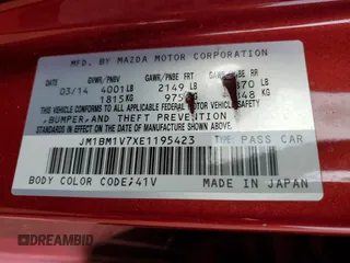 2014 Mazda 3 i Touring with VIN JM1BM1V7XE1195423, listed as a Copart auction lot 56702485 with 113,442 mi miles and Salvage title. Bid and sale history available at DreamBid. Image 12.
