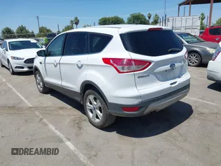 2014 Ford Escape SE with VIN 1FMCU9G98EUA39702, listed as a IAAI auction lot 42683914 with 276,162 mi miles and . Bid and sale history available at DreamBid. Image 3.