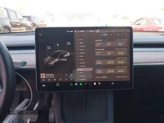 2022 Tesla Model Y Long Range z VIN 7SAYGDEE4NF522698, wystawiony jako IAAI lot #41287885 z przebiegiem 82 306 mil mil oraz . Historia ofert i sprzedaży dostępna na DreamBid. Obrazek 7.