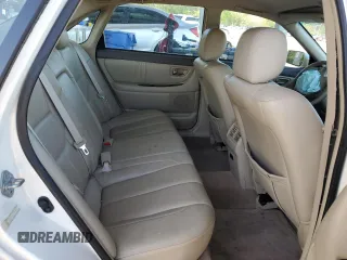2000 Toyota Avalon XL with VIN 4T1BF28B6YU093177, listed as a Copart auction lot 51853895 with 189,631 mi miles and Salvage Title. Bid and sale history available at DreamBid. Image 10.
