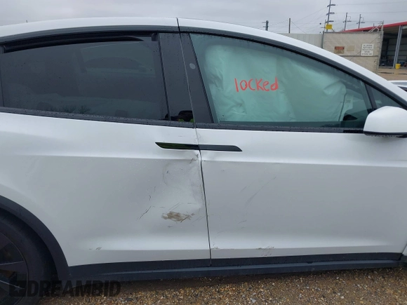 2022 Tesla Model X Plaid with VIN 7SAXCBE68NF333394, listed as a IAAI auction lot 41615086 with Not Provided miles and . Bid and sale history available at DreamBid. Image 12.