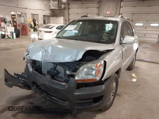 2005 Kia Sportage LX with VIN KNDJE723X57071792, listed as a IAAI auction lot 41441318 with 249,652 mi miles and . Bid and sale history available at carsss.com. Image 6.