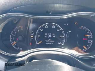 2018 Jeep Grand Cherokee Laredo E z VIN 1C4RJEAG9JC131344, wystawiony jako IAAI lot #42218060 z przebiegiem 126 639 mil mil oraz . Historia ofert i sprzedaży dostępna na DreamBid. Obrazek 7.