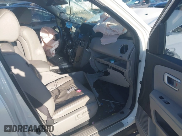 2014 Honda Pilot Touring with VIN 5FNYF4H96EB027336, listed as a IAAI auction lot 41882333 with 202,426 mi miles and . Bid and sale history available at carsss.com. Image 5.