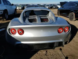 2006 Lotus Elise z VIN SCCPC11136HL31487, wystawiony jako Copart lot #79508394 z przebiegiem 27 575 mil mil oraz Szkody całkowita. Historia ofert i sprzedaży dostępna na DreamBid. Obrazek 6.