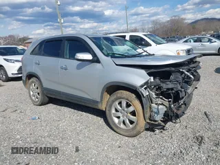 2013 Kia Sorento LX with VIN 5XYKTDA65DG405832, listed as a IAAI auction lot 41811700 with 154,167 mi miles and . Bid and sale history available at DreamBid. Image 1.