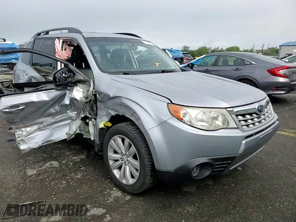 2013 Subaru Forester X Limited with VIN JF2SHAEC9DH424022, listed as a Copart auction lot 63052205 with 118,970 mi miles and Salvage title. Bid and sale history available at DreamBid. Image 14.