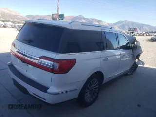 2020 Lincoln Navigator with VIN 5LMJJ2NT0LEL07488, listed as a Copart auction lot 73396634 with Not provided miles and Salvage title. Bid and sale history available at DreamBid. Image 3.