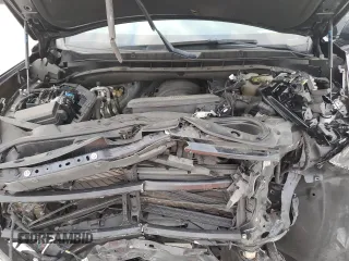 2021 Chevrolet Tahoe LS z VIN 1GNSCMKD5MR229435, wystawiony jako Copart lot #81240864 z przebiegiem 103 660 mil mil oraz Nie do naprawy • Non repairable. Historia ofert i sprzedaży dostępna na DreamBid. Obrazek 14.