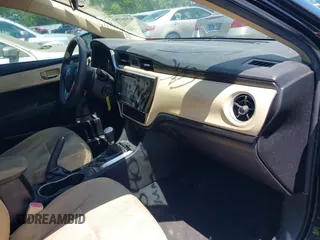 2019 Toyota Corolla L with VIN 5YFBURHE4KP860848, listed as a IAAI auction lot 42167529 with 152,301 mi miles. Bid and sale history available at carsss.com. Image 5.