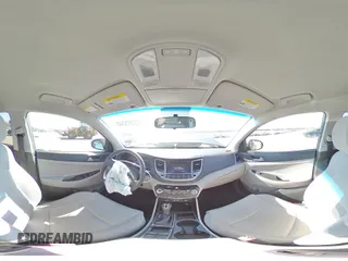 2017 Hyundai Tucson SE z VIN KM8J33A44HU376246, wystawiony jako Copart lot #52453345 z przebiegiem 97 306 mil mil oraz Szkoda całkowita • Salvage title. Historia ofert i sprzedaży dostępna na DreamBid. Obrazek 14.