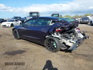 2020 Tesla Model 3 Standard Range Plus z VIN 5YJ3E1EA9LF599332, wystawiony jako IAAI lot #41563213 z przebiegiem Nie podano mil oraz . Historia ofert i sprzedaży dostępna na DreamBid. Obrazek 3.