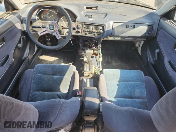 1992 Acura Integra with VIN JH4DB1649NS000455, listed as a Copart auction lot 62386755 with 209,785 mi miles and Salvage title. Bid and sale history available at DreamBid. Image 8.