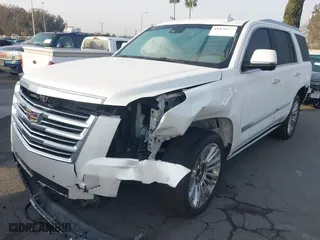 2016 Cadillac Escalade Platinum with VIN 1GYS4DKJ5GR260260, listed as a IAAI auction lot 41476668 with 108,058 mi miles. Bid and sale history available at carsss.com. Image 2.