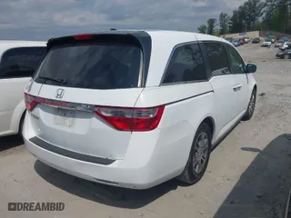 2013 Honda Odyssey EX-L with VIN 5FNRL5H61DB010029, listed as a IAAI auction lot 42011772 with 220,000 mi miles. Bid and sale history available at carsss.com. Image 4.