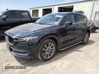 2020 Mazda CX-5 Grand Touring with VIN JM3KFBDM0L0767634, listed as a Copart auction lot 54433935 with 57,901 mi miles and Salvage Title. Bid and sale history available at carsss.com. Image 1.
