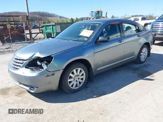 2010 Chrysler Sebring Touring with VIN 1C3CC4FB9AN190314, listed as a IAAI auction lot 41929715 with 102,939 mi miles and . Bid and sale history available at DreamBid. Image 2.