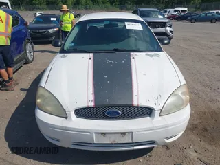 2007 Ford Taurus SE with VIN 1FAFP53U57A187358, listed as a IAAI auction lot 42583317 with Not provided miles and . Bid and sale history available at DreamBid. Image 12.