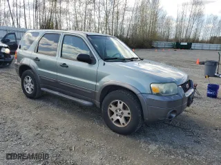2005 Ford Escape XLT with VIN 1FMYU93195KD73674, listed as a Copart auction lot 51586545 with 142,572 mi miles and Clean Title. Bid and sale history available at carsss.com. Image 4.