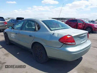 2005 Ford Taurus SE with VIN 1FAFP53U75A226240, listed as a IAAI auction lot 42066974 with 190,043 mi miles. Bid and sale history available at carsss.com. Image 3.