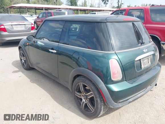 2005 MINI Hardtop with VIN WMWRC334X5TC59101, listed as a IAAI auction lot 42467671 with 180,264 mi miles and . Bid and sale history available at DreamBid. Image 3.