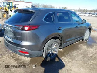 2022 Mazda CX-9 Sport with VIN JM3TCBBY5N0614589, listed as a IAAI auction lot 41295944 with 49,193 mi miles and . Bid and sale history available at DreamBid. Image 4.