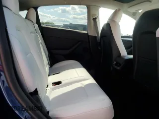 2023 Tesla Model Y Long Range z VIN 7SAYGDEE3PA178832, wystawiony jako Copart lot #57156005 z przebiegiem 12 920 mil mil oraz Szkody całkowita. Historia ofert i sprzedaży dostępna na DreamBid. Obrazek 10.