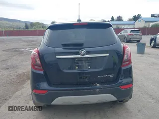 2021 Buick Encore Preferred with VIN KL4CJESBXMB331159, listed as a IAAI auction lot 42049200 with 95,379 mi miles and . Bid and sale history available at DreamBid. Image 16.