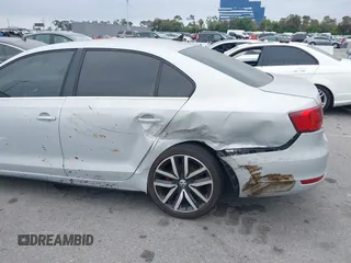 2012 Volkswagen Jetta GLI Autobahn with VIN 3VW4A7AJ1CM450205, listed as a IAAI auction lot 42421504 with 130,602 mi miles and . Bid and sale history available at DreamBid. Image 6.