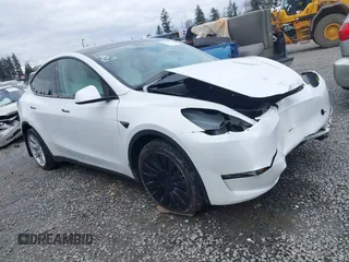 2023 Tesla Model Y Long Range with VIN 7SAYGAEEXPF647352, listed as a IAAI auction lot 41955933 with Not provided miles and . Bid and sale history available at DreamBid. Image 1.