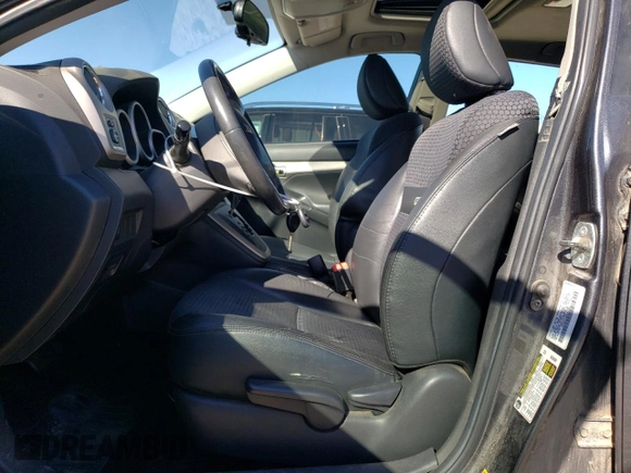 2009 Pontiac Vibe GT with VIN 5Y2SR67069Z431300, listed as a Copart auction lot 75325804 with 318,306 mi miles and Clean Title. Bid and sale history available at carsss.com. Image 7.