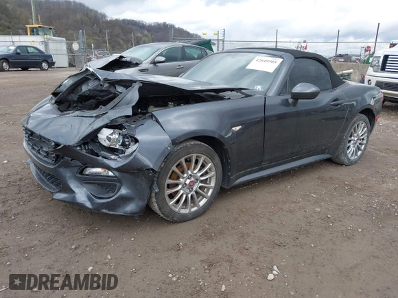 2017 FIAT 124 Spider Lusso z VIN JC1NFAEK7H0106877, wystawiony jako IAAI lot #42049505 z przebiegiem 54 487 mil mil oraz . Historia ofert i sprzedaży dostępna na DreamBid. Obrazek 18.
