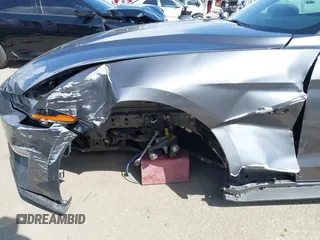 2021 Ford Mustang GT Premium с VIN 1FATP8FF2M5152511, выставлен на аукционе IAAI как лот 41950210 с пробегом 16 246 миль миль и . История ставок и продаж доступна на DreamBid. Изображение 17.