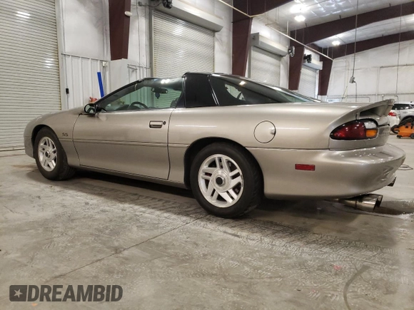 2001 Chevrolet Camaro Z28 z VIN 2G1FP22GX12112874, wystawiony jako Copart lot #70669594 z przebiegiem 58 773 mil mil oraz Szkoda całkowita • Salvage title. Historia ofert i sprzedaży dostępna na DreamBid. Obrazek 2.
