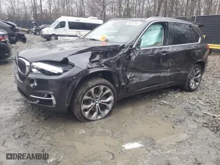 2014 BMW X5 xDrive50i with VIN 5UXKR6C57E0C02125, listed as a Copart auction lot 85639794 with 0 mi miles and Salvage Title. Bid and sale history available at carsss.com. Image 1.