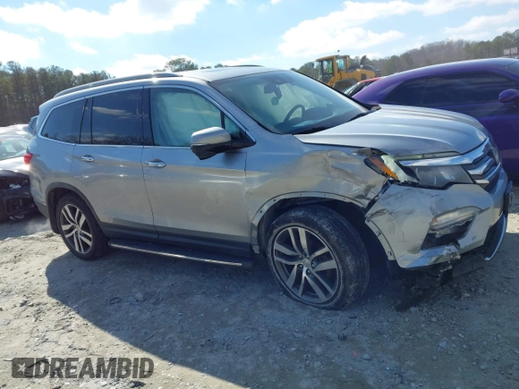 2017 Honda Pilot Touring with VIN 5FNYF6H94HB006873, listed as a IAAI auction lot 41618529 with 154,689 mi miles. Bid and sale history available at carsss.com. Image 13.