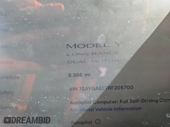 2024 Tesla Model Y Long Range with VIN 7SAYGAEE7RF205700, listed as a Copart auction lot 53814155 with 8,986 mi miles and Salvage Title. Bid and sale history available at DreamBid. Image 9.