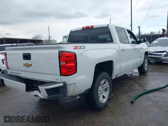 2018 Chevrolet Silverado 1500 LT with VIN 3GCUKREC3JG453433, listed as a IAAI auction lot 38138441 with 53,496 mi miles. Bid and sale history available at carsss.com. Image 4.