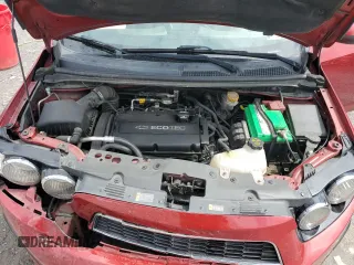 2016 Chevrolet Sonic LT z VIN 1G1JC5SG4G4175558, wystawiony jako Copart lot #57991275 z przebiegiem 133 497 mil mil oraz Szkoda całkowita • Salvage title. Historia ofert i sprzedaży dostępna na DreamBid. Obrazek 11.