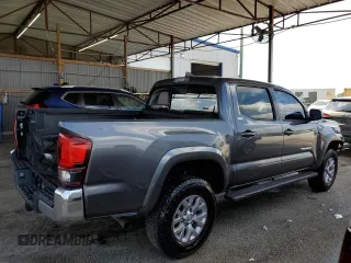 2018 Toyota Tacoma SR5 с VIN 5TFAZ5CN6JX061246, выставлен на аукционе Copart как лот 57845055 с пробегом 62 382 миль миль и Чистый • Clean title. История ставок и продаж доступна на DreamBid. Изображение 3.