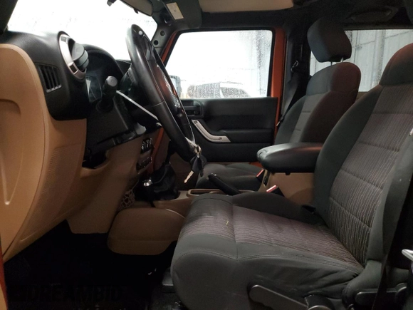 2011 Jeep Wrangler Sahara with VIN 1J4GA5D1XBL557392, listed as a Copart auction lot 56892835 with 109,567 mi miles and Clean title. Bid and sale history available at DreamBid. Image 7.