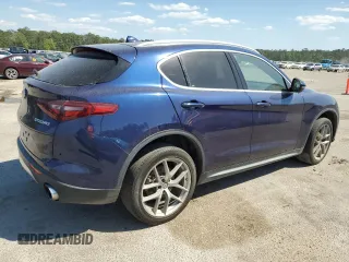 2018 Alfa Romeo Stelvio z VIN ZASFAKAN4J7B88776, wystawiony jako Copart lot #52402055 z przebiegiem 88 503 mil mil oraz Czysty tytuł • Clean title. Historia ofert i sprzedaży dostępna na DreamBid. Obrazek 3.