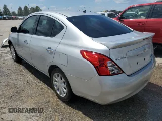 2013 Nissan Versa SV with VIN 3N1CN7AP2DL826394, listed as a Copart auction lot 63488554 with 131,940 mi miles and Salvage title. Bid and sale history available at DreamBid. Image 2.